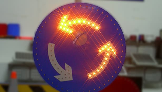 Solar Chevron traffic sign by NOKIN installed on highway curve—high-brightness LED penetrates rain/fog, visible over 1km, reminds drivers to slow down, reduces collision risks. No wiring, quick deployment for remote/off-grid areas.