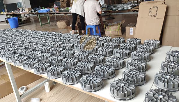 Aluminum structural parts for solar road studs organized in production line