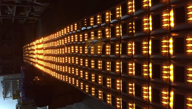 Large - scale embedded solar road studs under indoor testing with bright illumination