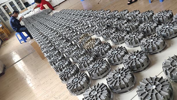 Bulk manufacturing of NOKIN solar road stud parts in production facility, ensuring supply capacity