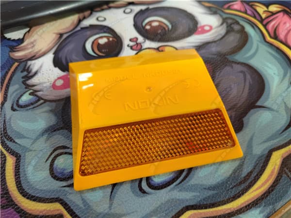 reflective road stud pavement marker on motorway