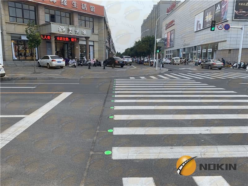 Solar road studs for Intelligent pedestrian crosswalk system