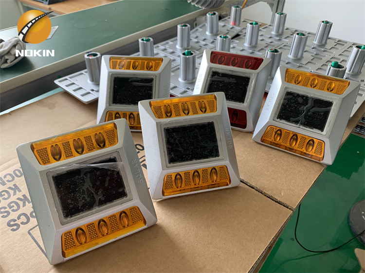 Yellow light solar road stud production